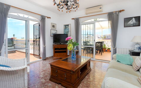 Nerja Penthouse: Table, Meubles, Propriété, Bleu, Plante, Bleu Azur, Cabinetry, Canapé, Design Intérieur, Bois