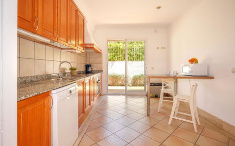 Cala Mesquida: Cabinetry, Comptoir, Meubles, Bois, Cuisine, Appareil De Cuisine, Cuisinière, Design Intérieur, Orange, Électroménager
