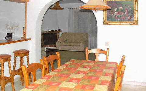 Golf Pals: Meubles, Table, Propriété, Chaise, Confort, Bois, Design Intérieur, Bâtiment, Tiroir, Orange