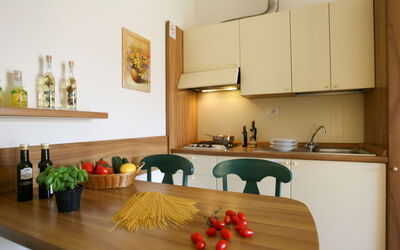 The Garda Village 618.1: Table, Meubles, Cabinetry, Comptoir, Évier, Bois, Orange, Design Intérieur, Cadre, Cuisine