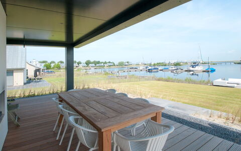 Oesterdam Resort: L'Eau, Propriété, Ciel, Table, Ombre, Mobilier De Jardin, Bois, Chaise, Bateau, Tableau De Plein Air