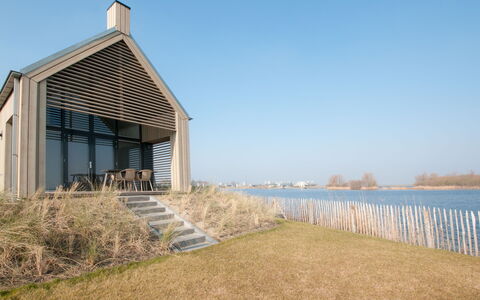 Oesterdam Resort: Propriété, Ciel, Maison, Mer, Immobilier, Rive, Côte, Bâtiment, Architecture, Domicile