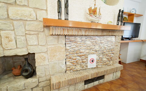 Casita Mar: Mur, Brique, Mur De Pierre, Tuile, Foyer, Salon, Dalle, Cheminée