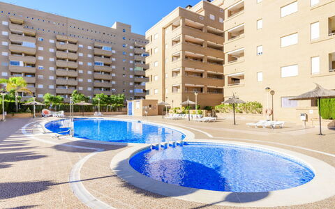 Jardines del Mar Ii - Marina D'Or: Plante, Ombre, Mobilier De Jardin, Arbre, Architecture, Immobilier, Loisir, Confort, Balancelle, Teintes Et Ombres
