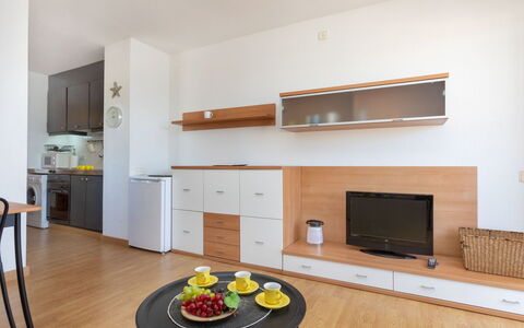 Del Sol: Cabinetry, Meubles, Propriété, Bâtiment, Bois, Cuisine, Éclairage, Orange, Table, Sol