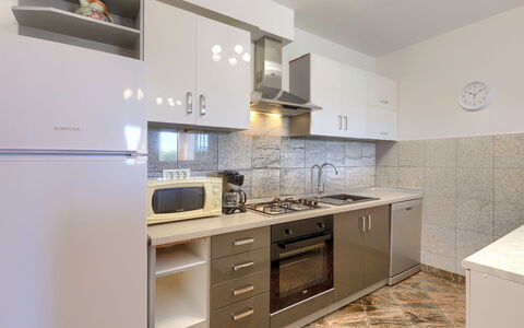 Goga: Comptoir, Cabinetry, Bâtiment, Robinet, Évier, Meubles, Cuisine, Evier, Cuisinière, Tiroir