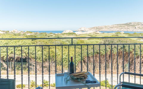 Capo Testa: Ciel, Plante, Propriété, Écorégion, Bleu Azur, Clôture, L'Eau, Ombre, Lot Terre, Herbe