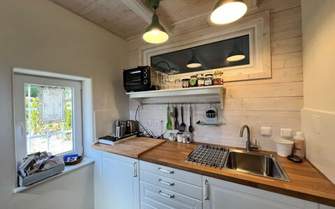 Tiny Lavender House: Comptoir, Cabinetry, Propriété, Evier, Évier, Robinet, Bâtiment, Cuisine, Design Intérieur, Bois