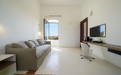 Suite 2 Superior: Oro di Eméra: Propriété, Meubles, Bâtiment, Confort, Bois, Salon, Sol, Maison, Lampe, Sol