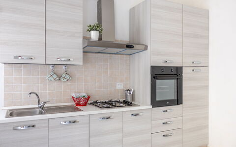 Maison Loreto: Cabinetry, Comptoir, Propriété, Meubles, Bâtiment, Robinet, Evier, Évier, Appareil De Cuisine, Cuisine