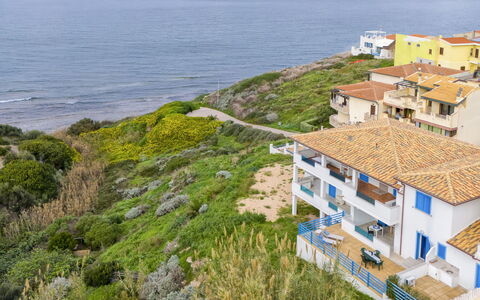La Gabbianella: L'Eau, Propriété, Plante, Bâtiment, Bleu Azur, Ciel, Fenêtre, Piscine, Design Urbain, Loisir