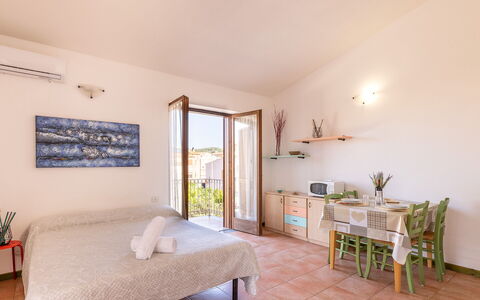 Casa Pavoncelle Apartments In Gallura: Mur, Appartement, Domicile, Balcon, Chaise, Plante D'Appartement, Porche, Hôtel, Mobilier De Jardin, Villa