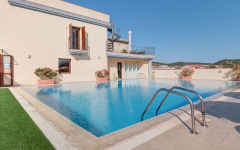 Le Fontane Apartments In Villasimius: Piscine, Recours, Hôtel, Thermes, Ville Resort, Centre De Loisirs, Villa, Eco Hôtel, Plante D'Appartement, Hacienda