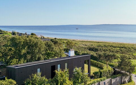 Nille - 30M from the Sea: Bois, Domicile, Porche, Plate-Forme, Dur, Toit, Tache De Bois, Parquet, Eco Hôtel