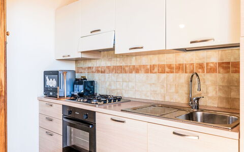 Casa del Mare: Cuisine, Principaux Appliance, Bois, Appareil De Cuisine, Comptoir, Design Intérieur, Sol, Cabinetry, Sol, Domicile
