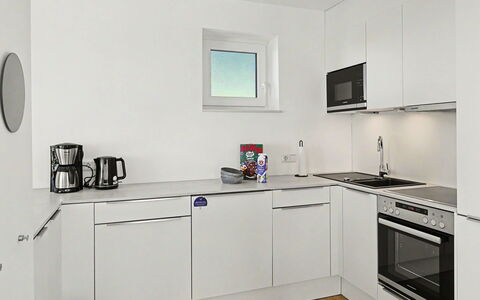 Penthouse Dümmerview: Cuisine, Appareil De Cuisine, Comptoir, Design Intérieur, Sol, Principaux Appliance, Cabinetry, Plafond, Sol, Meubles