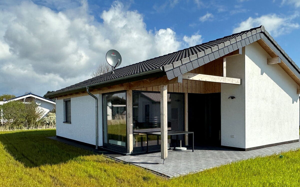 G6 Freistehendes Haus mit Garten und Wallbox