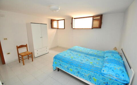 Appartamento Calanca, Marina di Mancaversa: Lit, Chambre, Sol, Drap De Lit, Meubles, Literie, Bois, Design Intérieur, Sol, Pièce