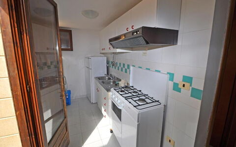 Appartamento Calanca, Marina di Mancaversa: Cuisine, Principaux Appliance, Appareil De Cuisine, Cuisinière, Sol, Comptoir, Bois, Sol, Gaz Poele, Design Intérieur