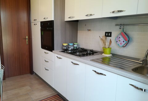 Villa Maddalena: Cuisine, Principaux Appliance, Appareil De Cuisine, Comptoir, Le Fourneau, Cuisinière, Sol, Cabinetry, Électroménager, Gaz Poele