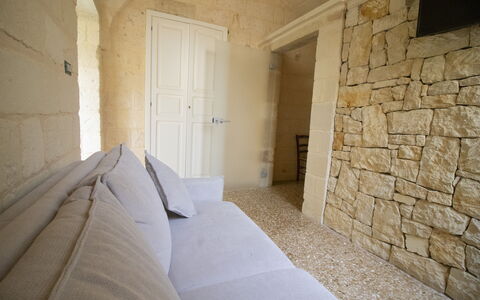 Coclea Heritage Suites: Mur, Sol, Sol, Mur De Pierre, Brique, Salon