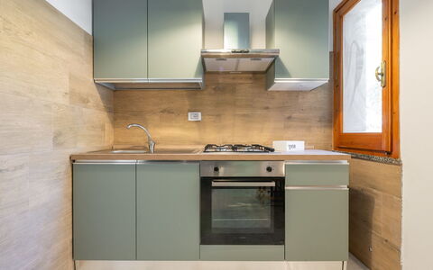 Villa sulla Roccia: Cuisine, Appareil De Cuisine, Principaux Appliance, Comptoir, Cabinetry, Sol, Bois, Design Intérieur, Électroménager, Cuisinière