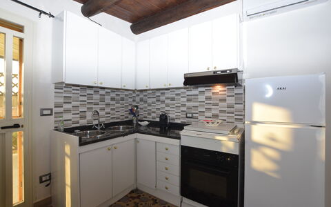 Villa Cigno Reale: Cuisine, Appareil De Cuisine, Comptoir, Principaux Appliance, Design Intérieur, Cabinetry, Sol, Bois, Cuisinière, Meubles