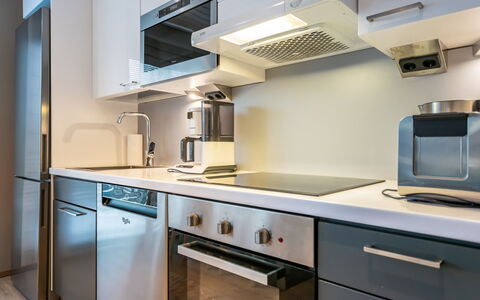 Golfarinkunnas 9A: Appareil De Cuisine, Cuisine, Comptoir, Cabinetry, Principaux Appliance, Cuisinière, Électroménager, Design Intérieur, Le Fourneau, Sol