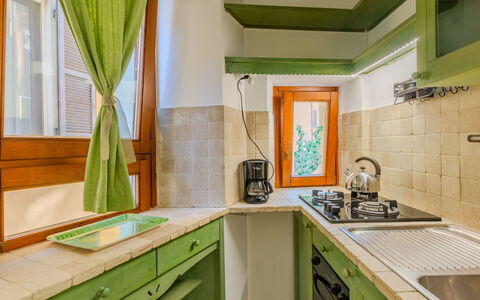 La Finestra sul Lago: Design Intérieur, Cuisine, Bois, Plafond, Sol, Comptoir, Principaux Appliance, Pièce, Sol, Appareil De Cuisine
