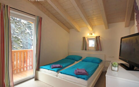 Am Arlberg: Chambre, Pièce, Propriété, Lit, Meubles, Plafond, Design Intérieur, Drap De Lit, Bâtiment, Cadre De Lit