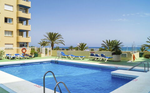 Puerto Paraíso: Piscine, Propriété, Bâtiment, Recours, Appartement, Immobilier, Vacances, Condominium, Maison, Ville